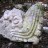 The carved serpent head found at the base of Vista Alegre’s temple structure. The carved serpent head most likely was one of a pair that would have been placed at the base of the balustrades flanking the main set of stairs leading to the top of the main temple structure. Team members found the serpent head in 2002 during the first visit to the site.(Credit: Image courtesy of Proyecto Costa Escondida Maritime Maya 2011 Expedition, NOAA-OER)