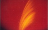 z-pinch-aurora Fig. 1. Starfish thermonuclear detonation July 9, 1962, 400 km above Johnston Island. The photograph was taken from a Los Alamos KC-135 aircraft three minutes after initiation time. An artificial striated aurora has already formed from the plasma particles, spreading along the earth’s magnetic field.The brightest background object (mark) at the top, left-hand corner, is the star Antares, while the right-most object is ? -Centauri. The burst point is two-thirds of the way up from the lowest plasma striation.